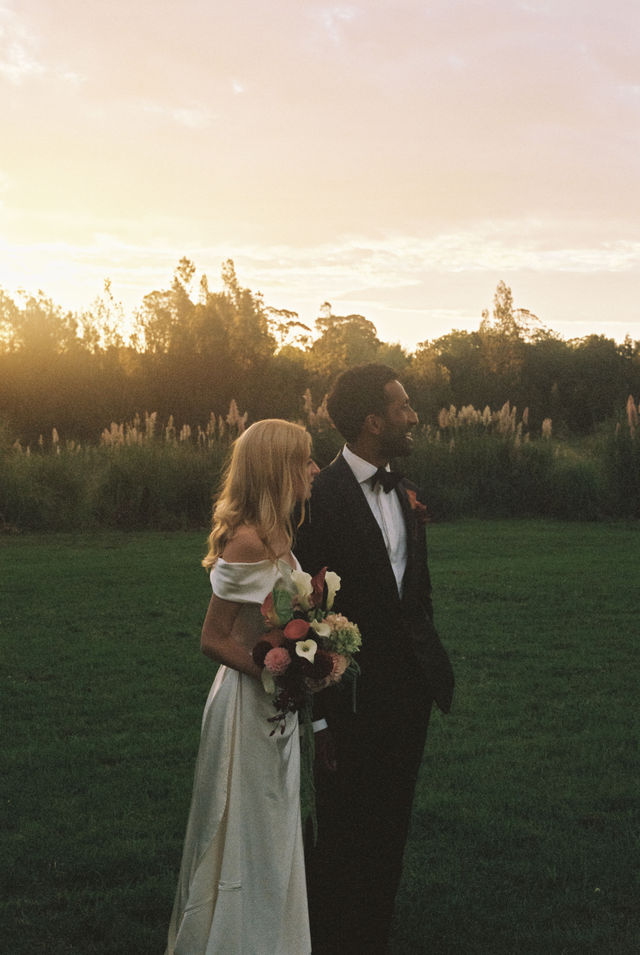 35mm film photograph of a couple at golden hour